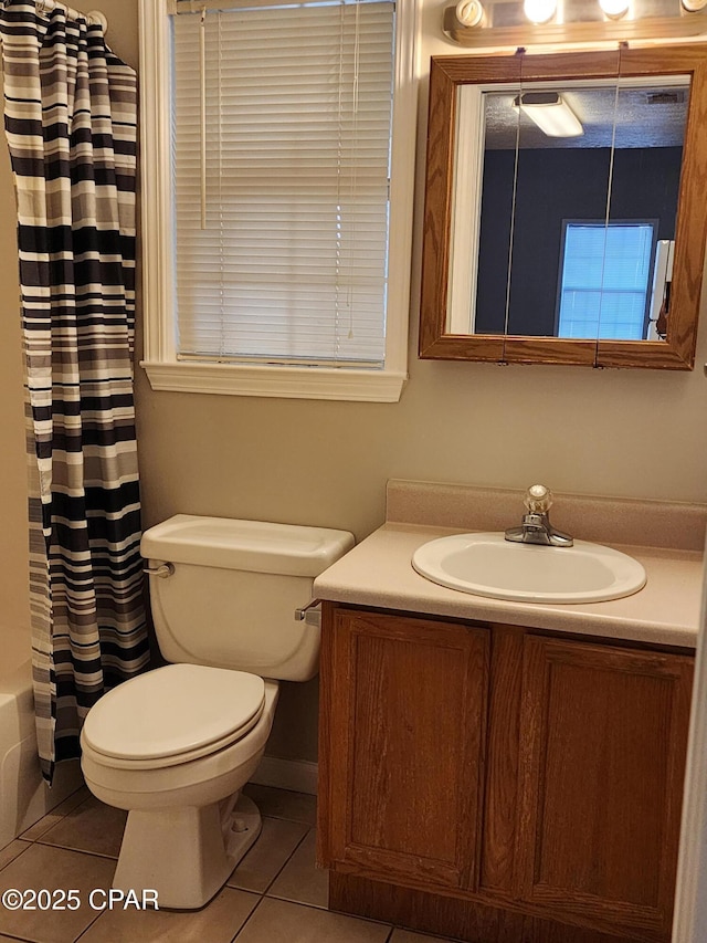 5432-5434 Sunset, Panama City, FL 32408 - full bath featuring vanity, tile patterned flooring, toilet, and shower / bath combination with curtain