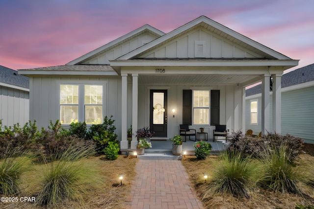 1708 Sumac Ct, Panama City, FL 32405 - view of front of property with board and batten siding and covered porch