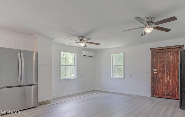 25966 George Maloy Ln, Altha, FL 32421 - unfurnished living room with ceiling fan, light wood-style flooring, ornamental molding, a wall unit AC, and baseboards