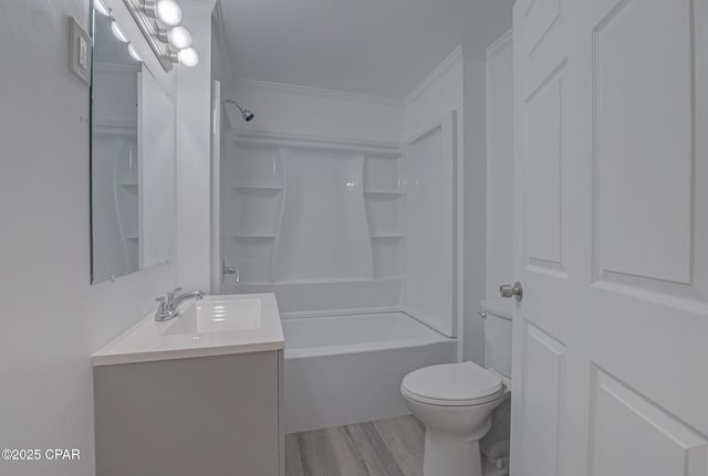 25966 George Maloy Ln, Altha, FL 32421 - full bathroom featuring vanity, toilet, bathtub / shower combination, wood finished floors, and ornamental molding
