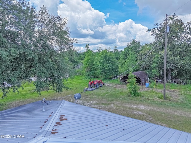 25966 George Maloy Ln, Altha, FL 32421 - wooden deck with a lawn