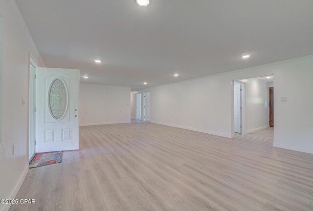 25966 George Maloy Ln, Altha, FL 32421 - unfurnished room featuring ornamental molding, recessed lighting, light wood finished floors, and baseboards