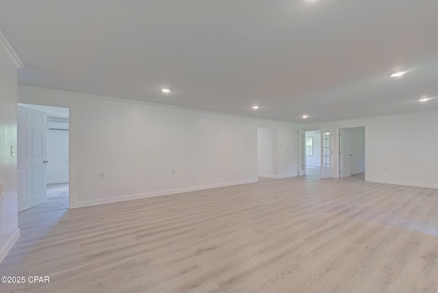 25966 George Maloy Ln, Altha, FL 32421 - empty room with crown molding, recessed lighting, baseboards, and light wood-style floors