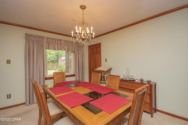 1206 Tyndall Dr, Panama City, FL 32401 - dining area with light carpet, a chandelier, baseboards, and ornamental molding