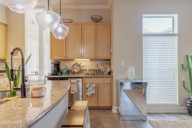 8700 Front Beach Rd Unit 8107, Panama City Beach, FL 32407 - kitchen with light brown cabinetry, crown molding, a sink, tasteful backsplash, and hanging light fixtures