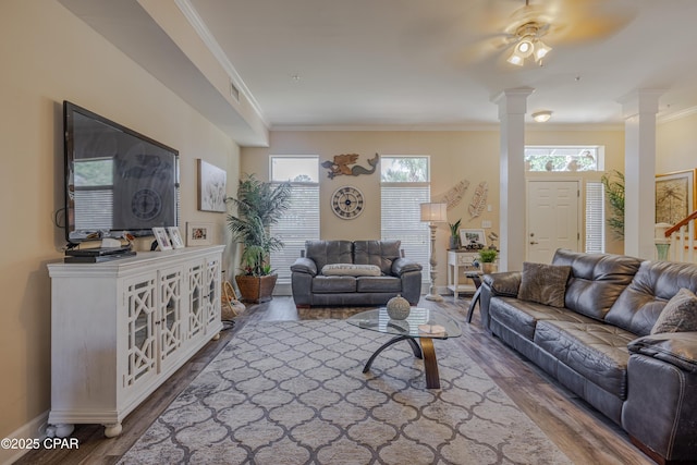 8700 Front Beach Rd Unit 8107, Panama City Beach, FL 32407 - living area featuring ornate columns, ornamental molding, wood finished floors, healthy amount of natural light, and baseboards