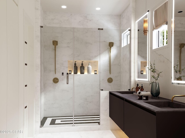 55 Grande Pointe Dr, Inlet Beach, FL 32461 - bathroom featuring a shower stall, double vanity, and recessed lighting