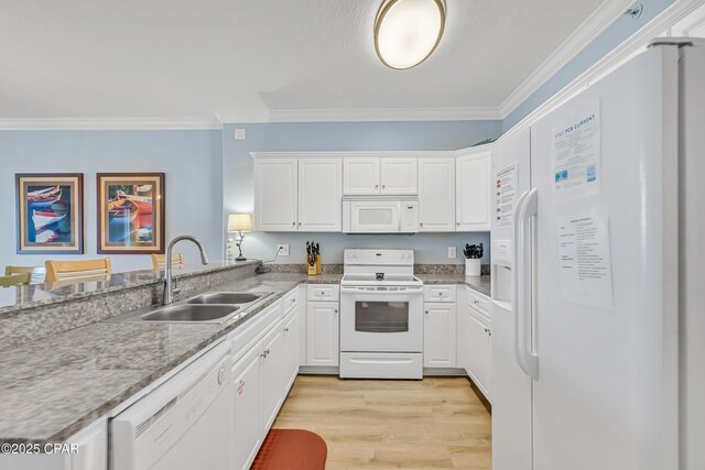 17545 Front Beach Rd Unit 2004, Panama City Beach, FL 32413 - kitchen with white appliances, a sink, crown molding, white cabinets, and light wood-style floors