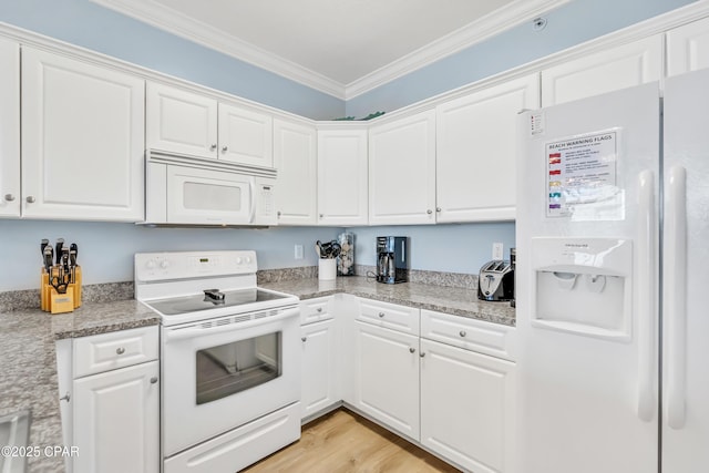 17545 Front Beach Rd Unit 2004, Panama City Beach, FL 32413 - kitchen with white appliances, crown molding, white cabinets, light countertops, and light wood-style flooring