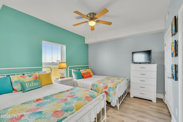 17545 Front Beach Rd Unit 2004, Panama City Beach, FL 32413 - bedroom with light wood finished floors and ceiling fan