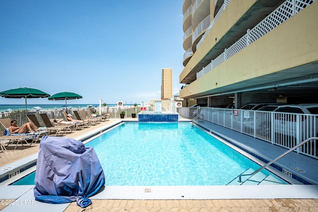 17545 Front Beach Rd Unit 2004, Panama City Beach, FL 32413 - community pool featuring a patio area