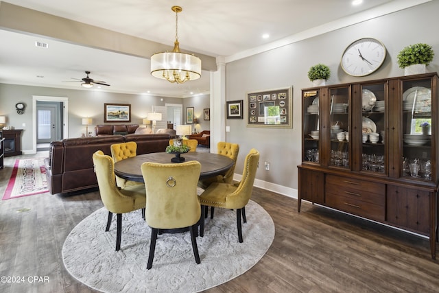 290 Rudys Blaze, Wewahitchka, FL 32465 - dining area with crown molding, baseboards, a chandelier, dark wood finished floors, and recessed lighting