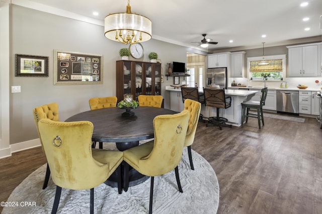 290 Rudys Blaze, Wewahitchka, FL 32465 - dining area featuring dark wood-style floors, crown molding, a ceiling fan, recessed lighting, and baseboards