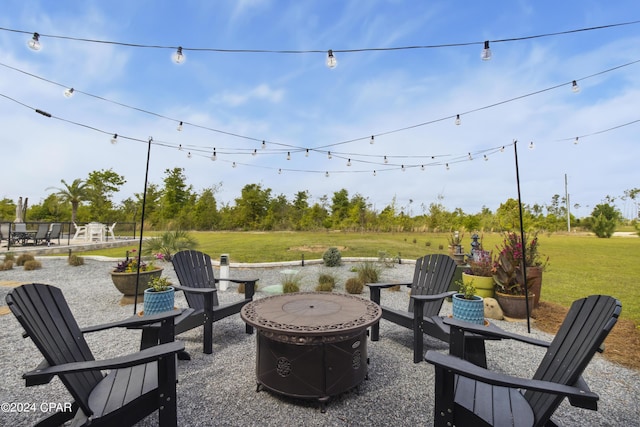 290 Rudys Blaze, Wewahitchka, FL 32465 - view of patio featuring an outdoor fire pit