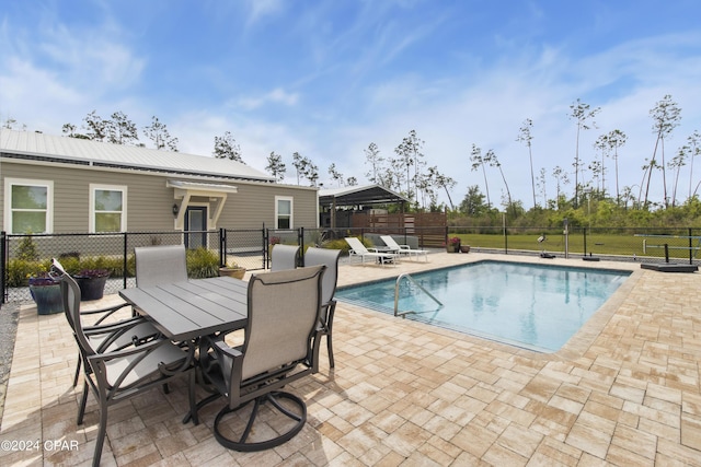290 Rudys Blaze, Wewahitchka, FL 32465 - view of swimming pool with a patio area, a sink, and outdoor dining area