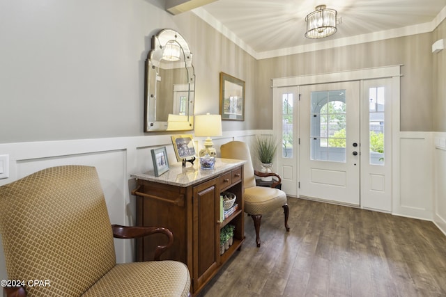 290 Rudys Blaze, Wewahitchka, FL 32465 - entrance foyer featuring wood finished floors, a wainscoted wall, a decorative wall, and a chandelier