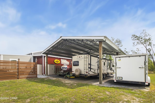 290 Rudys Blaze, Wewahitchka, FL 32465 - view of outbuilding with a detached carport