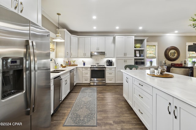 290 Rudys Blaze, Wewahitchka, FL 32465 - kitchen featuring appliances with stainless steel finishes, a sink, open shelves, ornamental molding, and light countertops