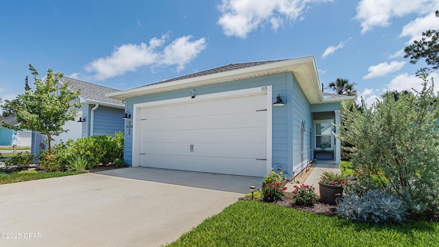 113 Mosaic Dr, Port St Joe, FL 32456 - garage featuring concrete driveway
