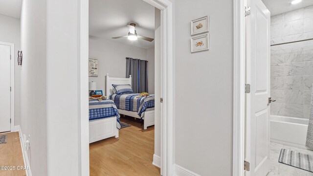113 Mosaic Dr, Port St Joe, FL 32456 - corridor with light wood-type flooring and baseboards
