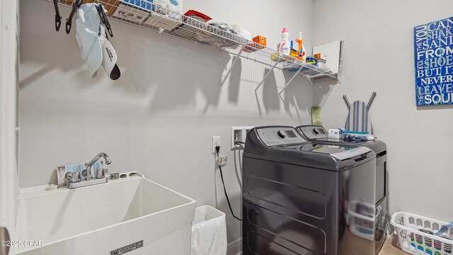 113 Mosaic Dr, Port St Joe, FL 32456 - laundry room with washer and clothes dryer
