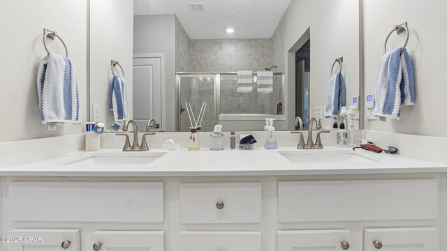 113 Mosaic Dr, Port St Joe, FL 32456 - full bathroom featuring double vanity and a shower stall