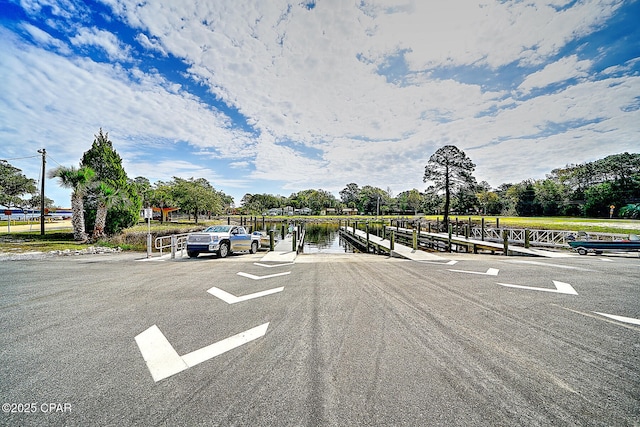 823 Bradley Cir, Lynn Haven, FL 32444 - view of car parking featuring a boat dock