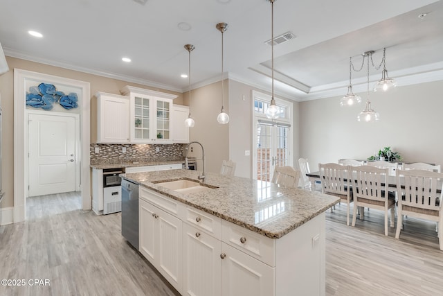 4134 Cobalt Cir Unit Ro14, Panama City Beach, FL 32408 - kitchen with stainless steel dishwasher, a sink, light wood-type flooring, ornamental molding, and glass insert cabinets