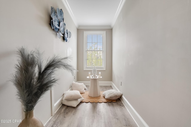 4134 Cobalt Cir Unit Ro14, Panama City Beach, FL 32408 - sitting room featuring ornamental molding, wood finished floors, and baseboards
