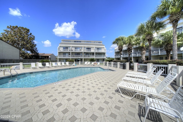 17614 Front Beach Rd Unit 17E, Panama City Beach, FL 32413 - community pool featuring a patio