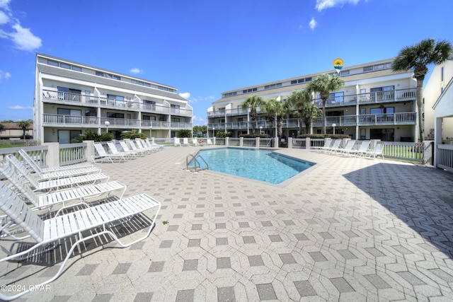 17614 Front Beach Rd Unit 17E, Panama City Beach, FL 32413 - community pool with a patio area
