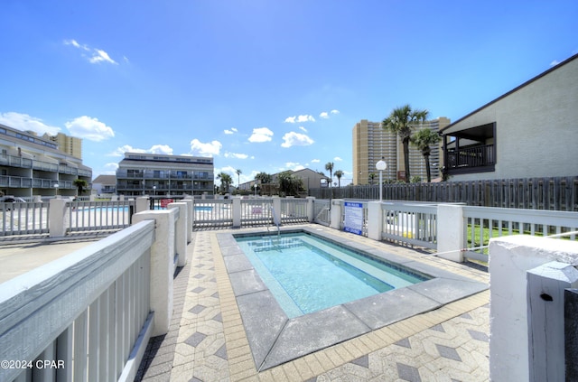 17614 Front Beach Rd Unit 17E, Panama City Beach, FL 32413 - view of swimming pool with a community hot tub and a swimming pool