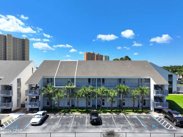 17614 Front Beach Rd Unit 17E, Panama City Beach, FL 32413 - view of property featuring uncovered parking