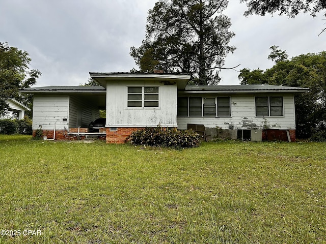 2958 Russ St, Marianna, FL 32446 - rear view of property with a yard and metal roof