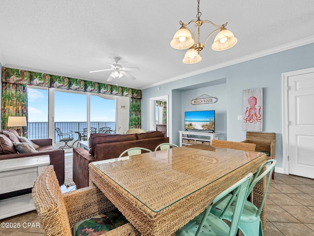 9450 S Thomas Dr Unit 1211, Panama City, FL 32408 - dining room with a chandelier, crown molding, ceiling fan, a textured ceiling, and tile patterned flooring