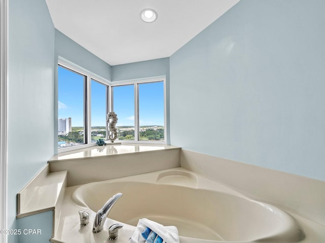 9450 S Thomas Dr Unit 1211, Panama City, FL 32408 - bathroom featuring a garden tub