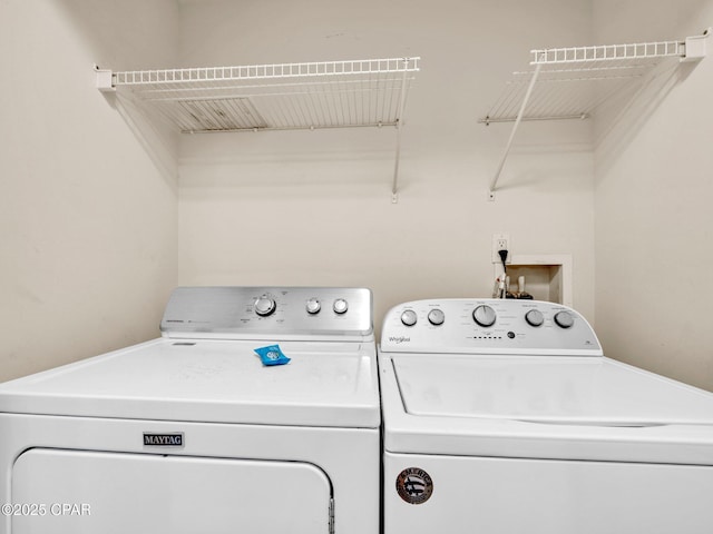 9450 S Thomas Dr Unit 1211, Panama City, FL 32408 - washroom with washer and dryer