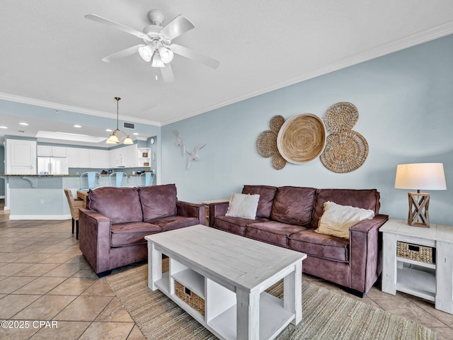 9450 S Thomas Dr Unit 1211, Panama City, FL 32408 - living area featuring ornamental molding, ceiling fan, light tile patterned flooring, and recessed lighting