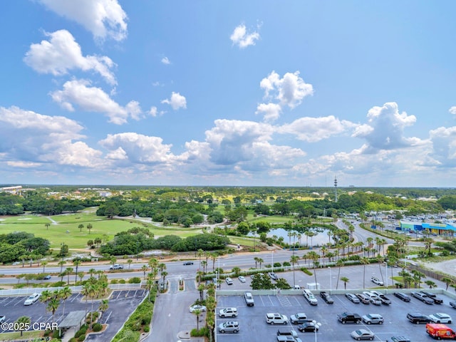 9450 S Thomas Dr Unit 1211, Panama City, FL 32408 - aerial view of a nearby body of water, a golf course, and a tree filled landscape