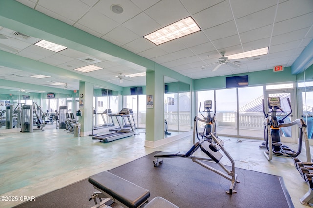 9450 S Thomas Dr Unit 1211, Panama City, FL 32408 - exercise room featuring a ceiling fan and a drop ceiling