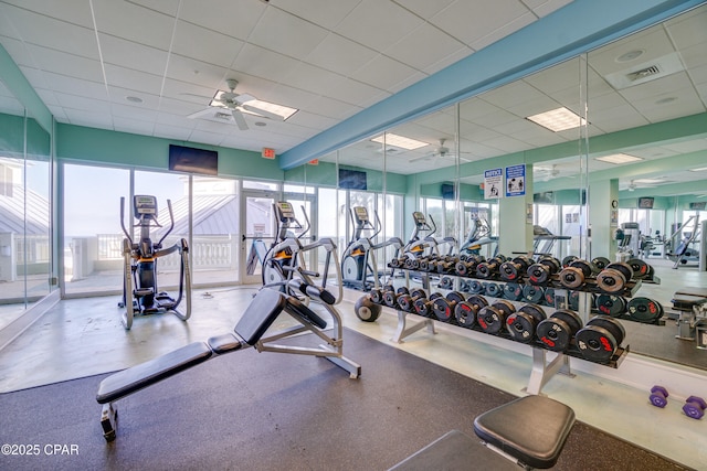 9450 S Thomas Dr Unit 1211, Panama City, FL 32408 - gym featuring a ceiling fan and a paneled ceiling