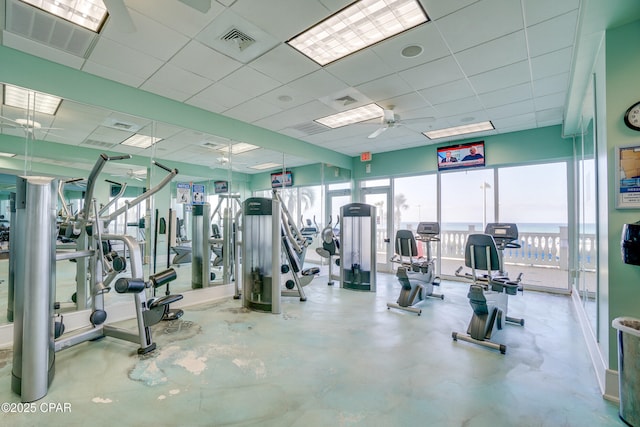9450 S Thomas Dr Unit 1211, Panama City, FL 32408 - exercise room with a ceiling fan and a drop ceiling