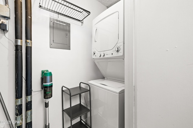 23223 Front Beach Rd Unit C1-502, Panama City Beach, FL 32413 - laundry area featuring stacked washer / drying machine and electric panel