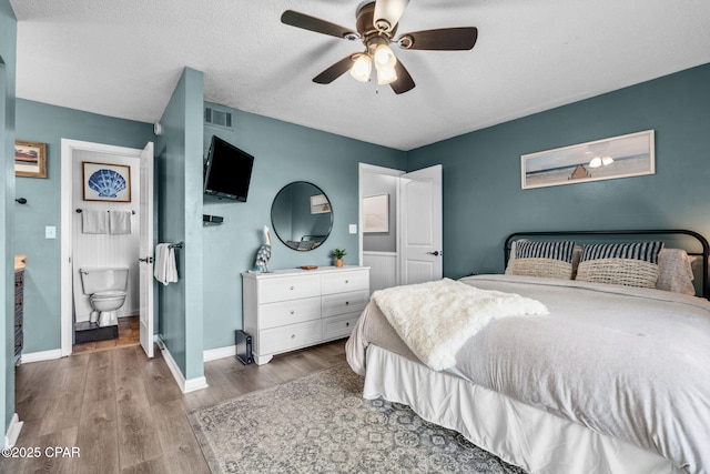17620 Front Beach Rd Unit P2, Panama City Beach, FL 32413 - bedroom featuring wood finished floors, baseboards, a textured ceiling, and ceiling fan