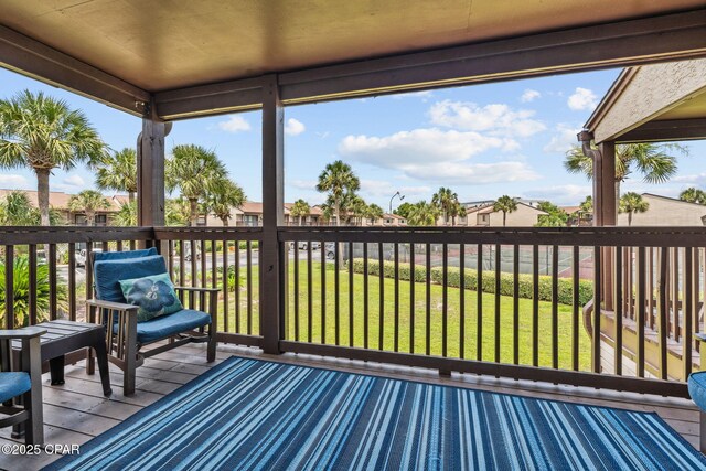 17620 Front Beach Rd Unit P2, Panama City Beach, FL 32413 - wooden deck with a yard and a residential view