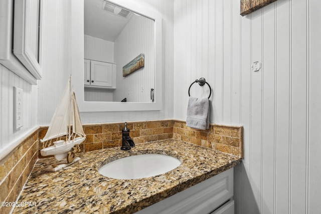 17620 Front Beach Rd Unit P2, Panama City Beach, FL 32413 - bathroom featuring vanity and tasteful backsplash