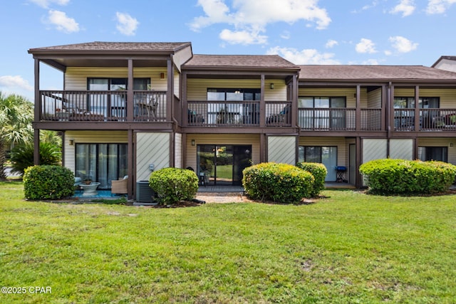 17620 Front Beach Rd Unit P2, Panama City Beach, FL 32413 - rear view of property with a lawn
