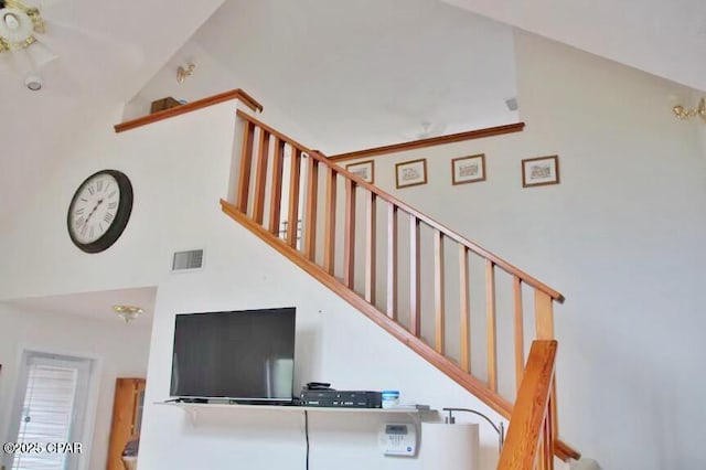 992 Hammond Lake Dr, Fountain, FL 32438 - stairway featuring high vaulted ceiling