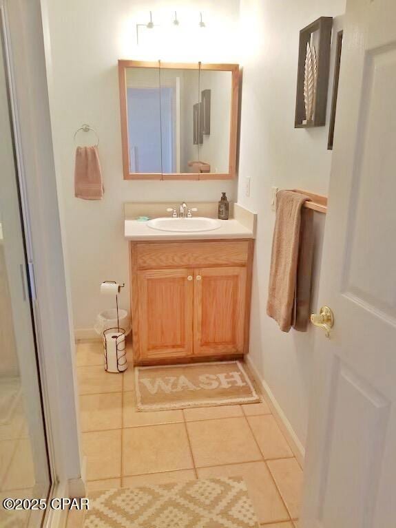 992 Hammond Lake Dr, Fountain, FL 32438 - bathroom featuring vanity and tile patterned floors