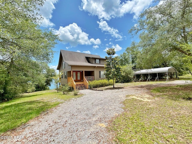992 Hammond Lake Dr, Fountain, FL 32438 - bungalow-style home with french doors and a front lawn